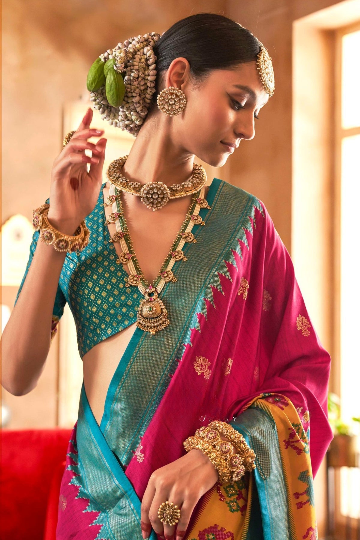 Magenta and Teal Printed Patola Saree