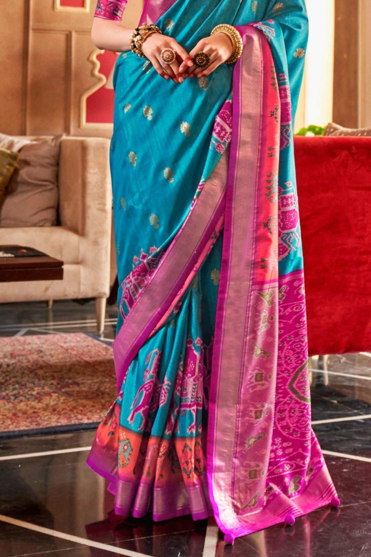 Teal and Rani Pink Printed Patola Saree