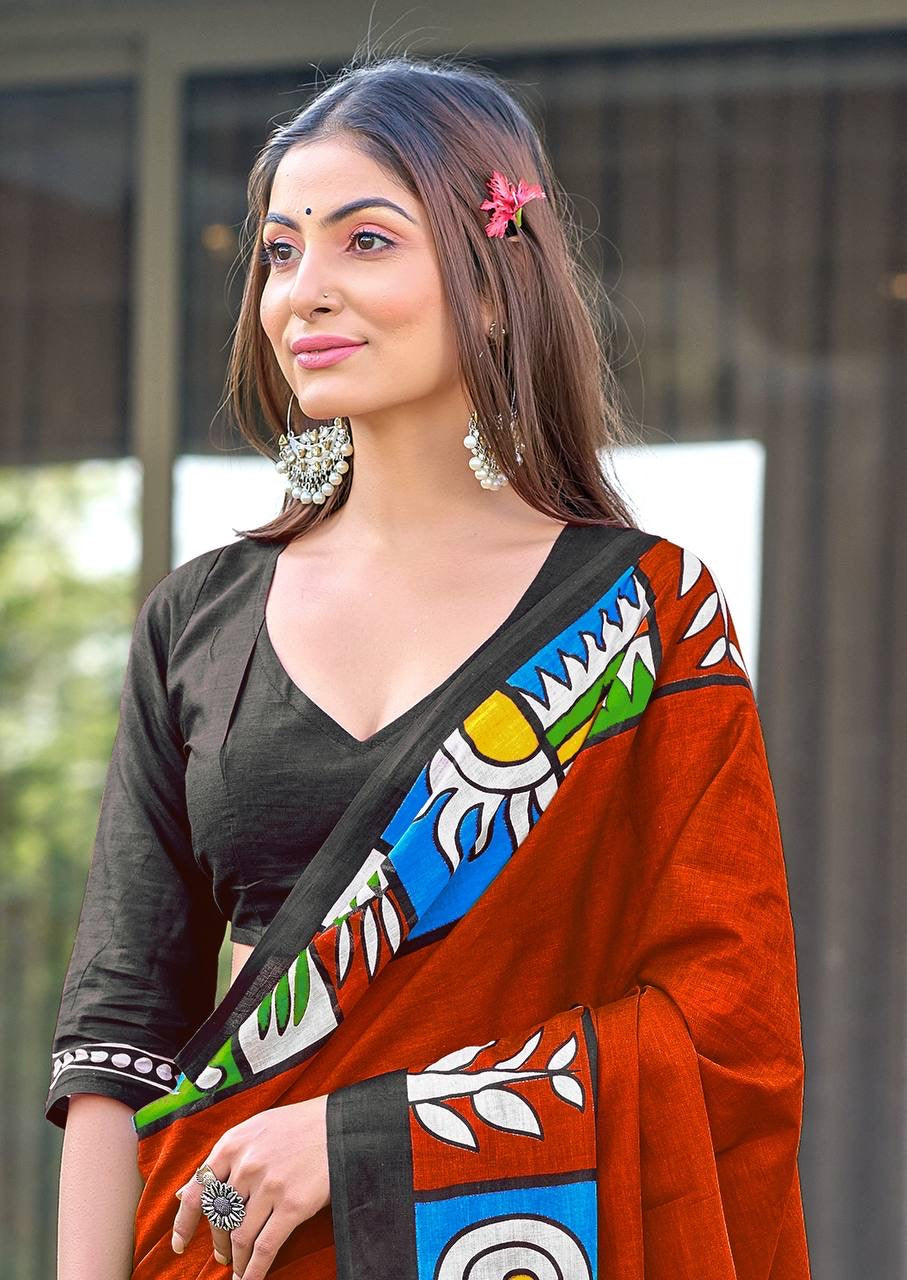 Rust Orange Cotton Saree with Vibrant Folk-Inspired Border