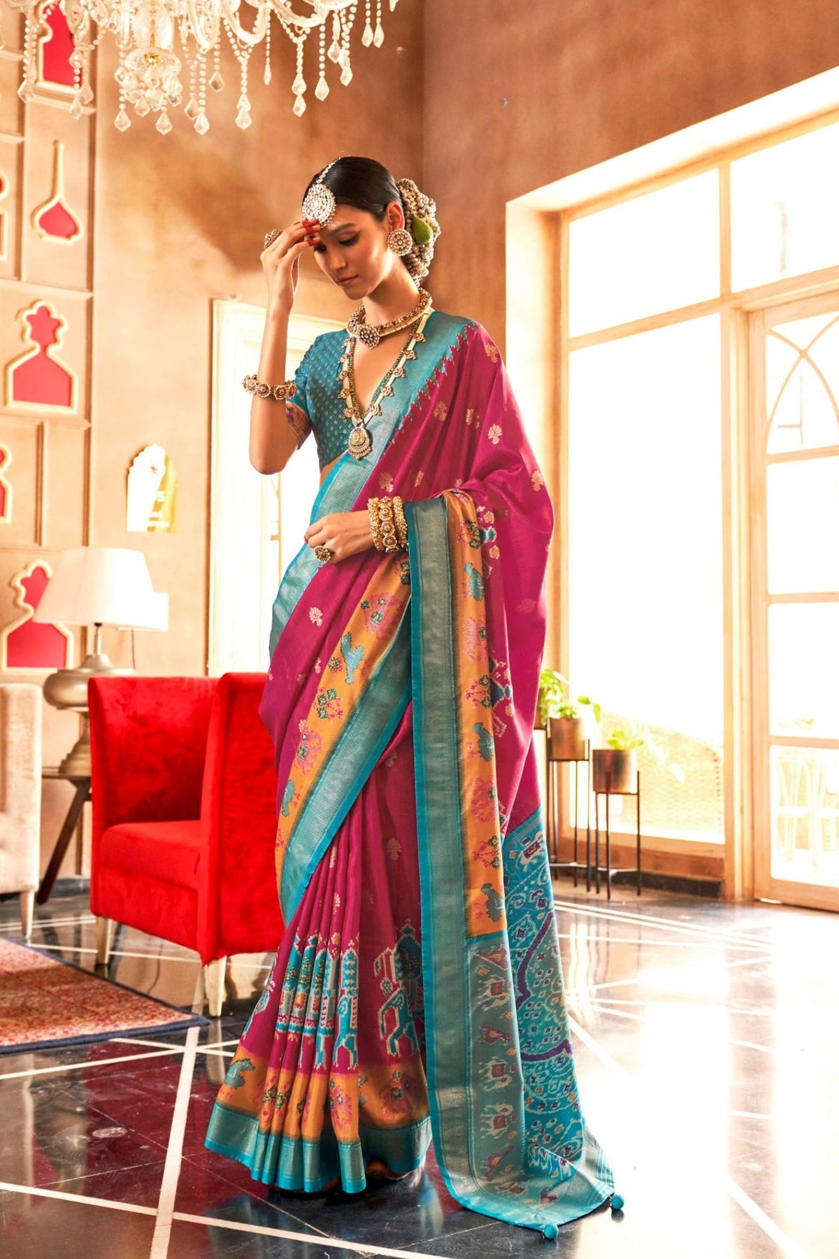 Magenta and Teal Printed Patola Saree