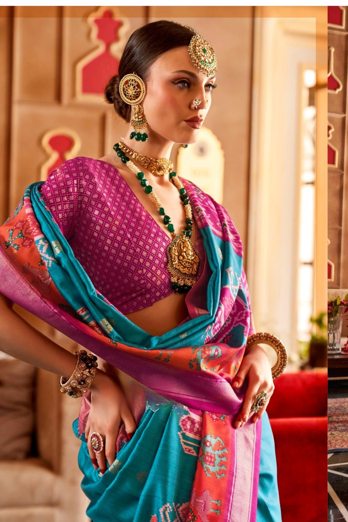 Teal and Rani Pink Printed Patola Saree