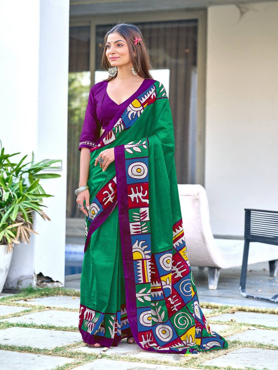 Vibrant Green Cotton Saree with Bold Folk-Inspired Border