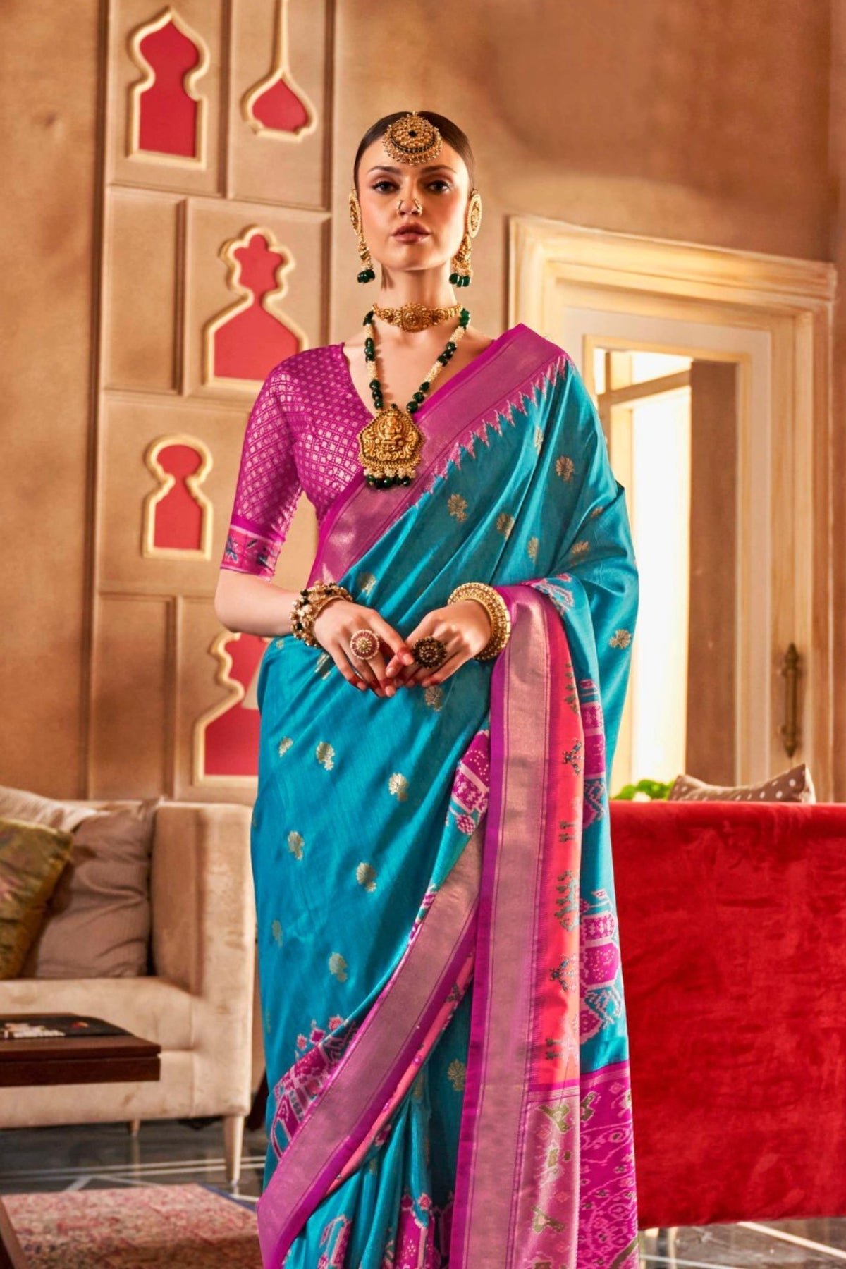 Teal and Rani Pink Printed Patola Saree